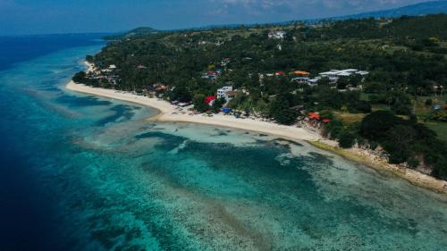 Beachfront Pool Villa 12 Min to Kawasan Falls Canyoneering Romantic Sunset & Ocean Views The Verge Cebu — 4-Star Luxury Hotel in Badian, Philippines