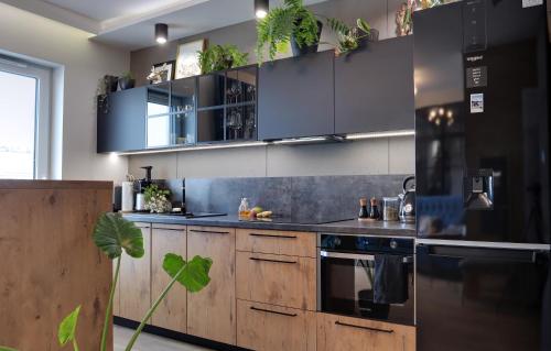 Stylowy Loft Apartament z Tarasem i Garażem — 4-Star Luxury Hotel in Kielce, Poland