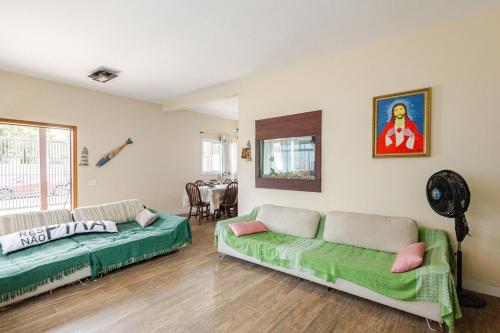 100m Da Praia Enseada Ar condicionado em todos os quartos in Bertioga, Brasil