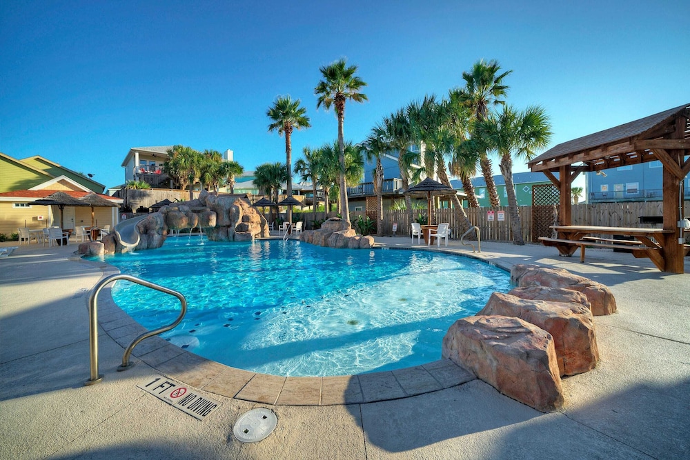 Private Yard Cornhole Resort Pool Oasis w Slide Down the Shore by Avantstay - photo 10