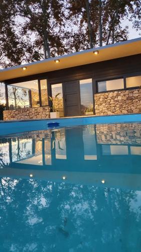 Casa de Piedra — 4-Star Luxury Hotel in Villa Basilio Nievas, Argentina