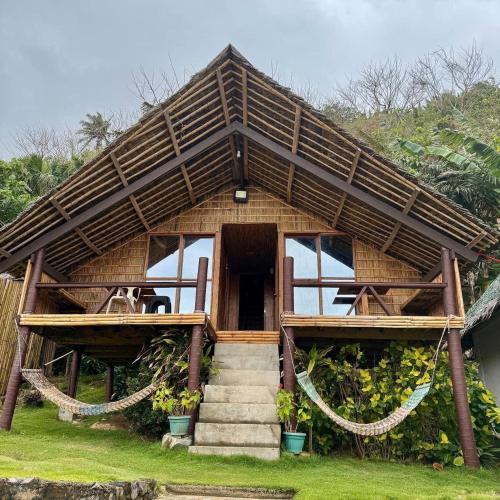 A frame Cottage 1 Puraran Surf Resort — Baras — photo 4