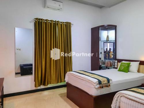 Wisma Auliyah Kolaka Utara Mitra RedDoorz — hotel in Lasusua