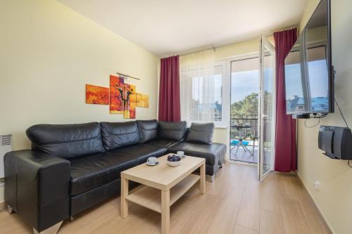 Spacerowa Apartament w Spokojnej Okolicy by Noclegi Renters — 4-Star Luxury Hotel in Pobierowo, Poland