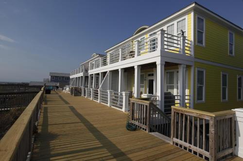 Salty Sunrise by Carolina Beach Realty in Kure Beach, United States