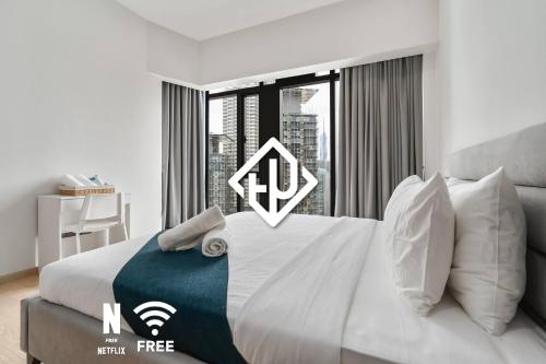 Comfy 1BR with Twin Towers View