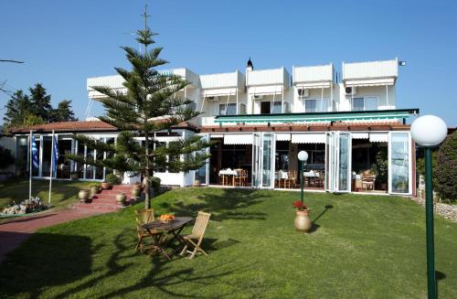 Evoikos beach & resort - carbon neutral hotel in Livanates