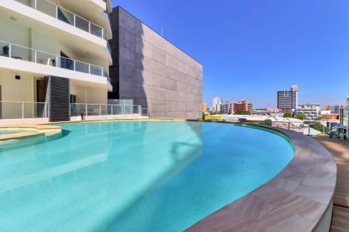 City Views on Pool Level King Bed — 4-Star Luxury Hotel in Darwin, Australia