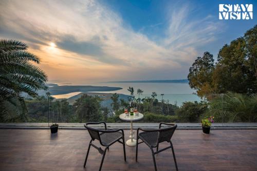 StayVista’s Lake Pearl Serenity Riverside Mountain View Villa with Jacuzzi Sprawling Lawn & Terrace