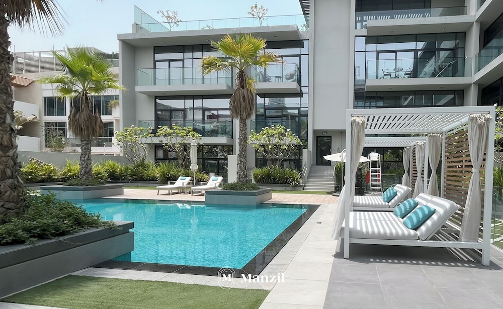 Manzil 1BR Apartment in JVC with Pool — 4-Star Luxury Hotel in Dubai, United Arab Emirates