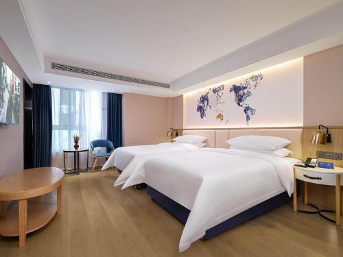 Kyriad Marvelous Hotel Henan Xinyang Pingqiao Plaza in Xinyang, People's Republic of China