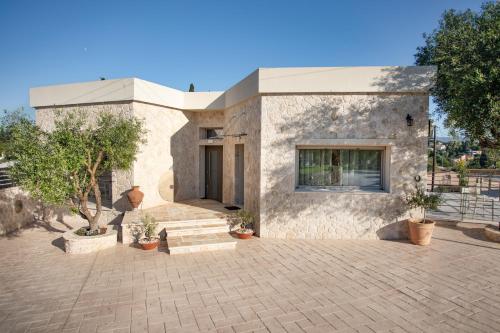 Olithos 1 — 4-Star Luxury Hotel in Kanali, Greece