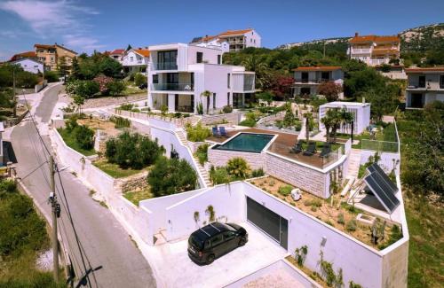 Luxury villa with a swimming pool Palit Rab 22153 — 4-Star Luxury Hotel in Rab, Croatia
