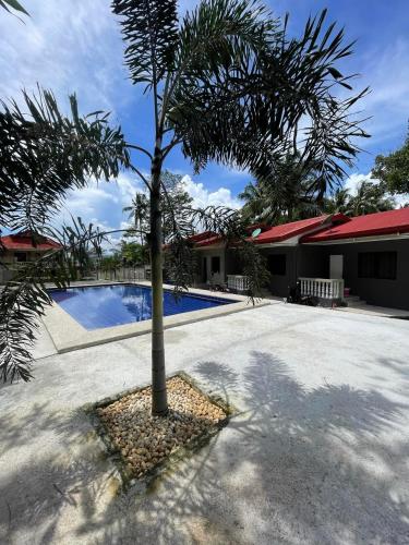 Kjt Travellers Inn — Guindulman