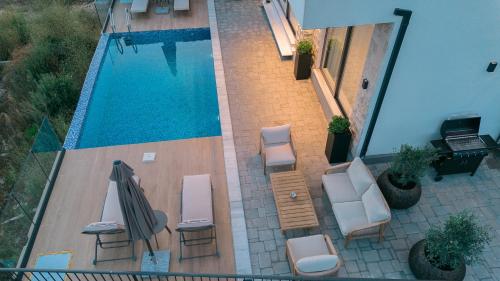 Omena Luxury Villas — Bar — photo 5
