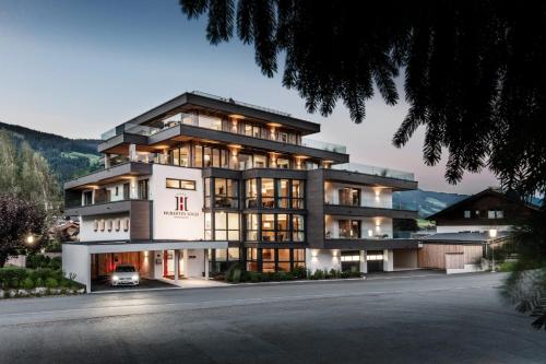 Hubertus Logis Apartments — 4-Star Luxury Hotel in Brixen Im Thale, Austria