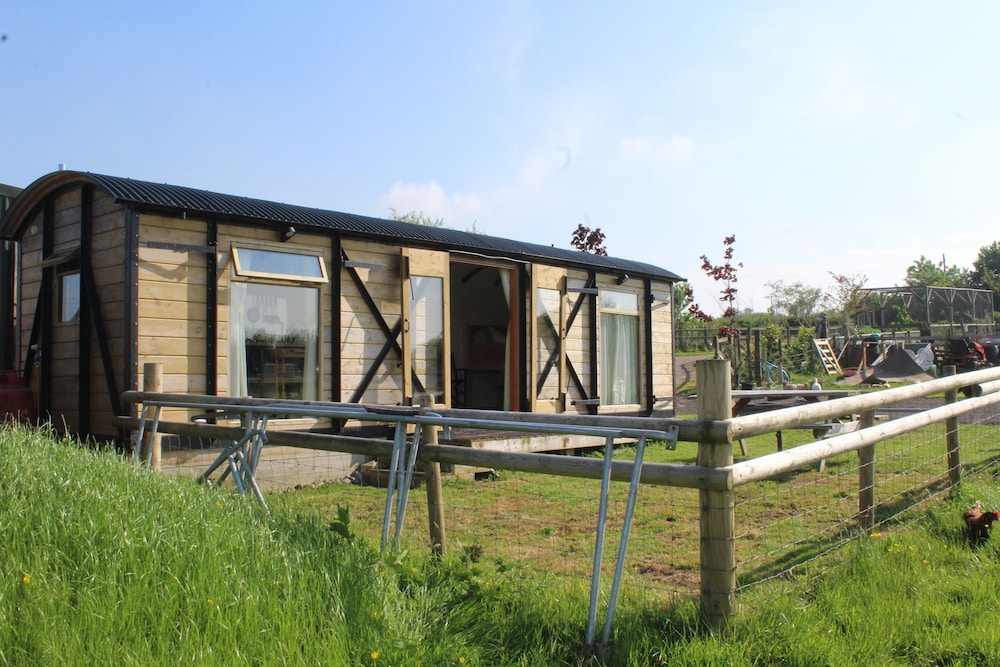 Greenacres Self Catering Railway Wagon Glamping in Bridport, United Kingdom