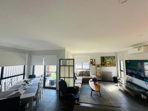 A Private Ensuite with AC and TV — 5-Star Luxury Hotel in Austral, Australia