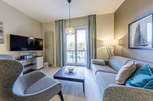 Boddenzeit Moderne Ferienwohnung mit Nordbalkon Wellnessbereich und Nähe zum Ostseestrand — 4-Star Luxury Hotel in Wustrow, Germany