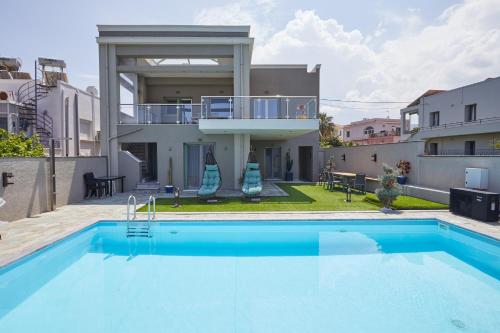 Poolside at Vrontados — 4-Star Luxury Hotel in Vrontados, Greece