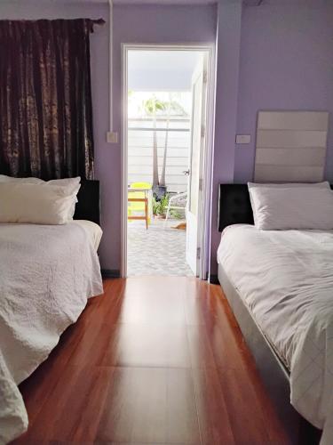 Mango Tree Guestroom - carbon neutral hotel in Bangkok