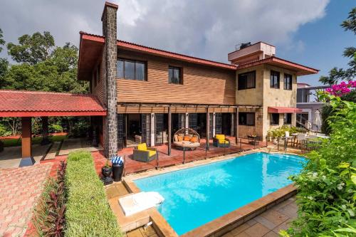 StayVista's Woodstone Villa Mountain Retreat with Heated Pool & Activities — 5-Star Luxury Hotel in Lonavla, India
