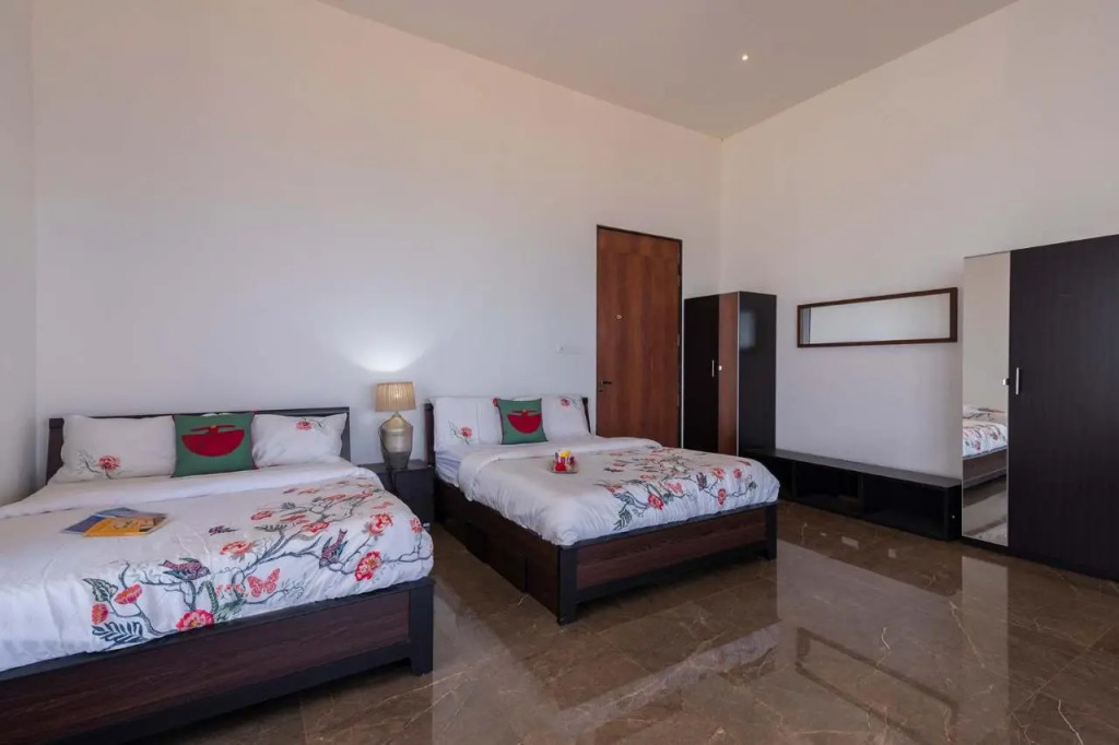 StayVista at Sunset on the Lake Infinity Lakeview Swimming Pool with Contemporary Interiors & Lavish Amenities