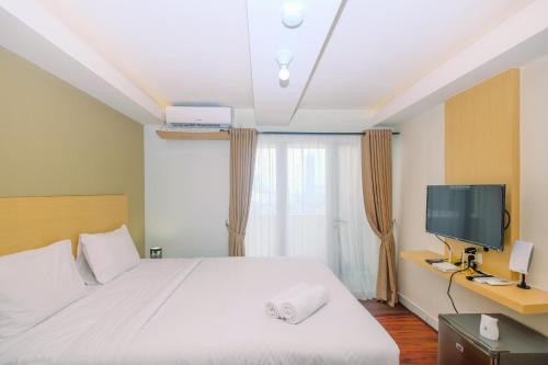 Relaxing and Stylish Studio at Amethyst Tower Apartment By Travelio — 4-Star Luxury Hotel in Jakarta, Indonesia