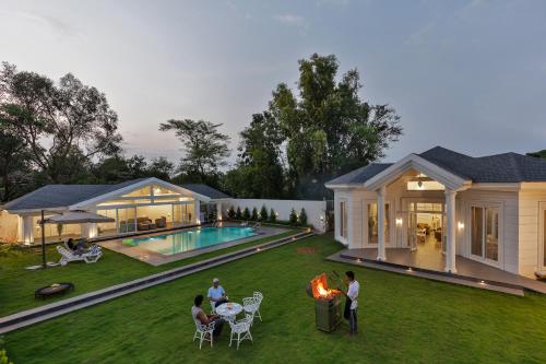 SaffronStays White Pearl 3BR Vikramgad villa pool gazebo pergola BBQ & bonfire near Pinjal Sajan & Kohoj — 4-Star Luxury Hotel in Vada, India