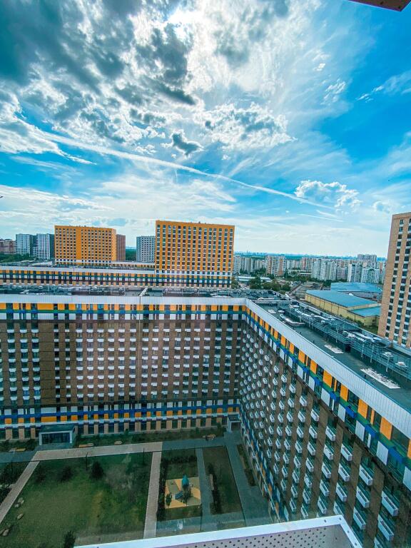 Sunny Days On The Street Of The Pilot Laryushin 4 Building 1 in Lyubertsy, Russia