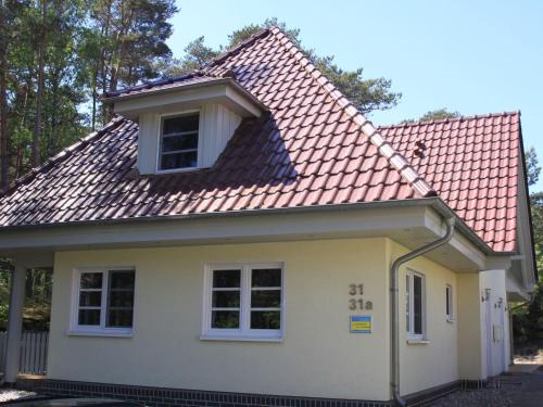 Doppelhaushälfte Dünenhaus I Trassenheide - carbon neutral hotel in Unknown City