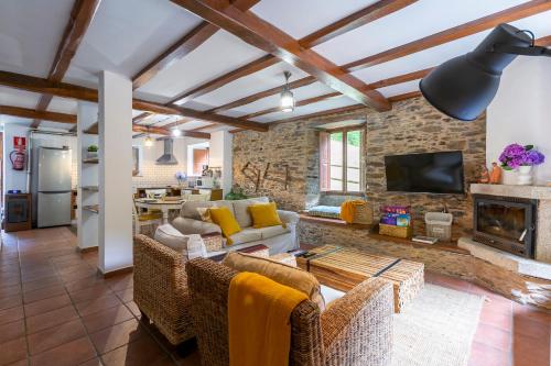 Casas del Molino Muiños do Mainzoso Turismo Rural — 4-Star Luxury Hotel in Paderne, Spain