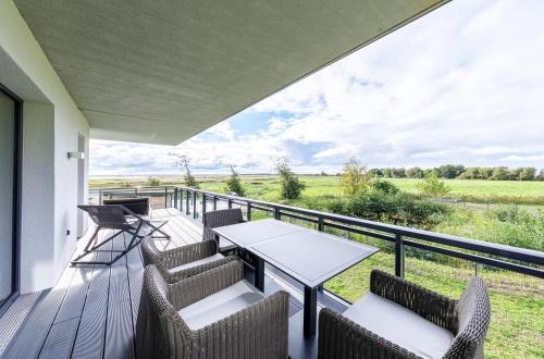 Strandnixe 5 Sterne Ferienwohnung mit Eckbalkon und traumhaften Blick — 4-Star Luxury Hotel in Wustrow, Germany