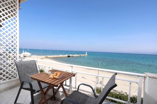Take me to the Sea 3 Beachfront Starlink Best Location in Pefkochori, Greece
