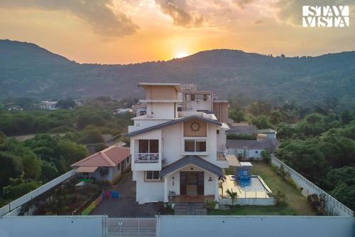 StayVista's Kaarma Villa Valley View Villa with Outdoor Pool Lawn featuring a Gazebo & Machan — 4-Star Luxury Hotel in Lonavla, India