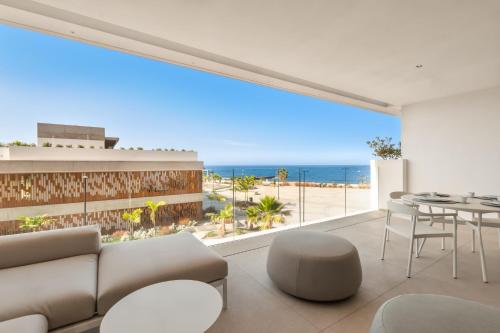 Infinity 1 2 Luxe Partial Sea View 2B in Arona, Spain