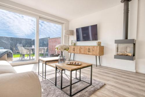 Bungalow Inselhuus Norddeich — 4-Star Luxury Hotel in Norddeich, Germany