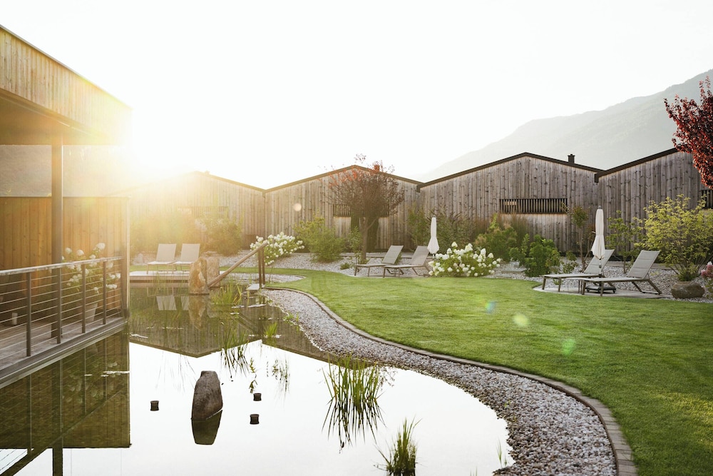Amolaris Garden Loges & Guesthouse — 4-Star Luxury Hotel in Laces, Italy