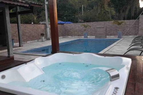 @ Chácara 5 Anjos Jacuzzi Incrível Água Quente in Itanhaem, Brasil