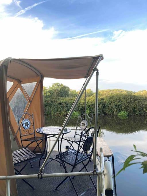 Dutch Cruiser Ship on a Tranquil Secluded River in Tonbridge, United Kingdom