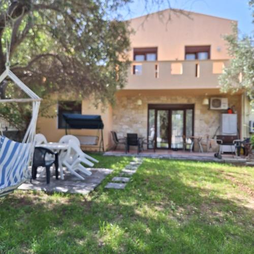 Ktima Manolas - carbon neutral hotel in Unknown City