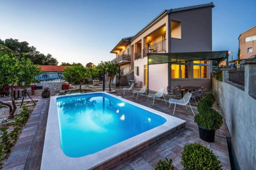 Seaside family friendly house with a swimming pool Razanj Rogoznica 19735 — 4-Star Luxury Hotel in Rogoznica, Croatia