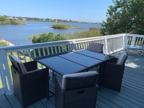 Waterfront Salt Pond House water view and dock — 4-Star Luxury Hotel in Charlestown, United States