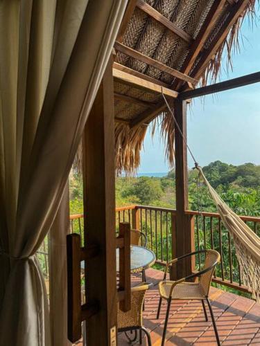 Cabaña Guacamaya Cielva Tayrona Vista al Mar y Jacuzzi Privado in Unknown City, Colombia