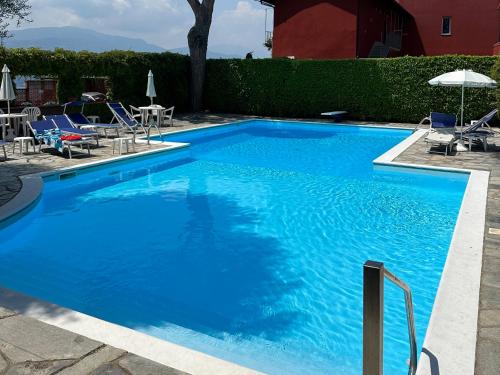 Apartment with Swimming Pool — 4-Star Luxury Hotel in Leggiuno, Italy