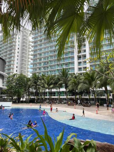 The Sunny Side at Azure with Pool and City View — 4-Star Luxury Hotel in Manila, Philippines