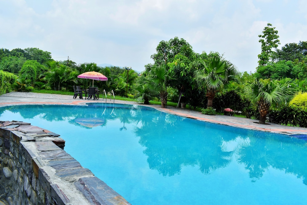 Corbett Wild Resort A River Access Property in Ramnagar, India
