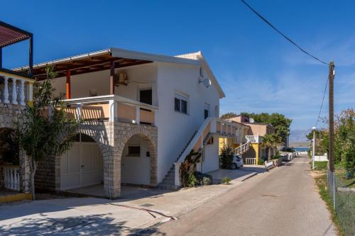 Apartments by the sea Vir 23033 in Vir, Croatia