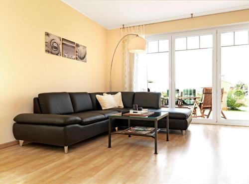 Doppelhäuser Timmendorf Strand Haus Taun Lüchttorm — 4-Star Luxury Hotel in Kirchdorf, Germany