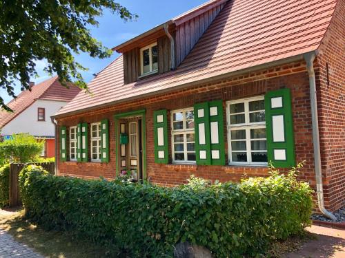 Ferienwohnung im Kapitänshaus — 4-Star Luxury Hotel in Wustrow, Germany